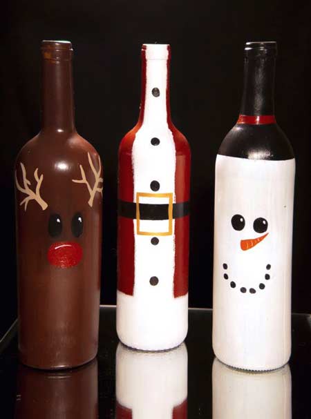 Bottiglie di vetro con renna, babbo natale, pupazzo di neve - decorazione natalizia fai da te