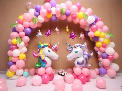 allestimento palloncini fai da te per festa unicorno - arco di palloncini con stelline mini shape