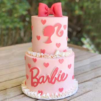 torta a tema Barbie a due piani, rosa con fiocco